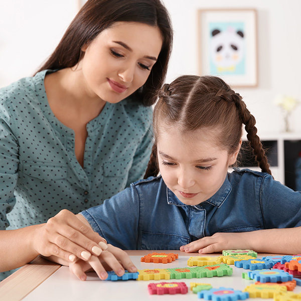 Child learn with therapist at Siskin Children's Institute