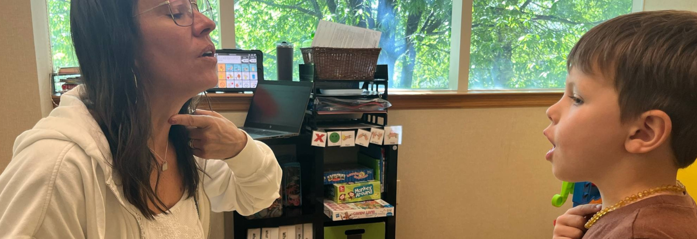 Child working with speech therapist